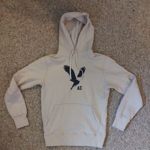 American Eagle Outfitters Cream Hoodie with Blue Logo